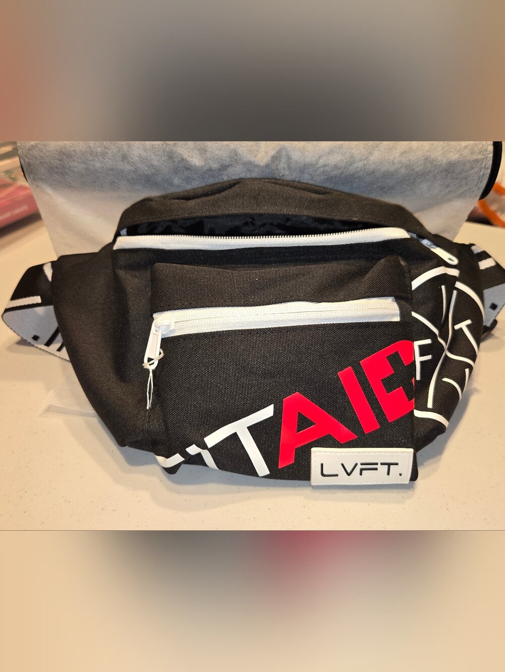 LIKE NEW - LIVEFIT Black & White Belt Bag with Red Accents